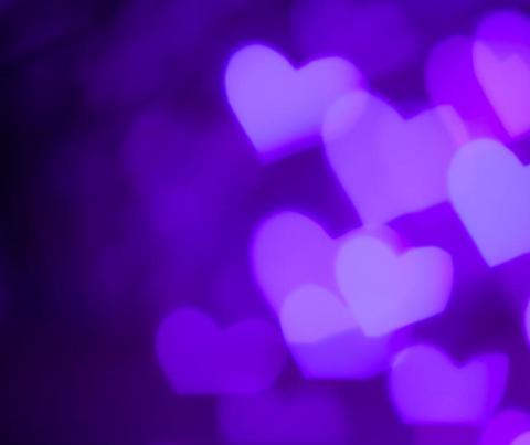 Promotional image for Alzheimer's/Dementia Support Group. Purple hearts against a black background.